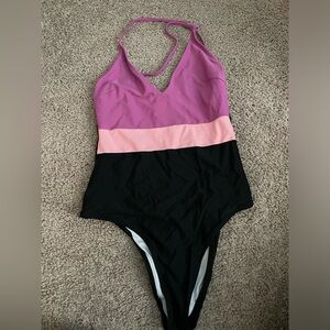 Purple and black swimsuit